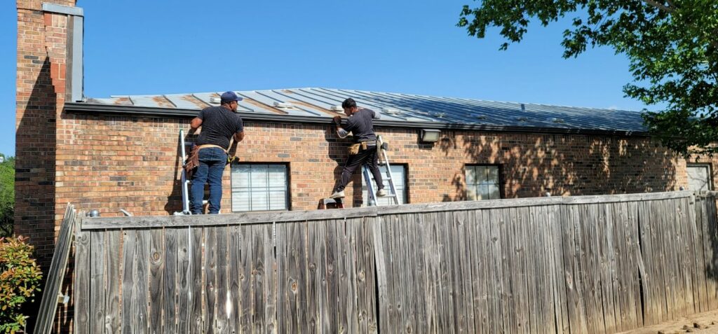at work_gutters Roof Experts repair and replace residential gutters in Dallas Fort Worth metroplex