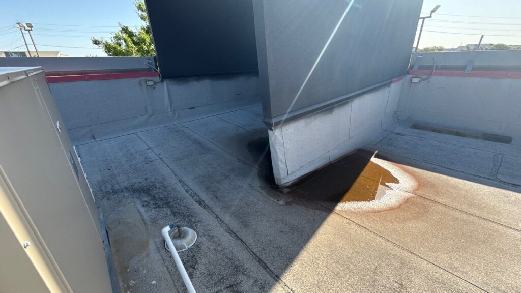 Roof repair crew at work on residential property