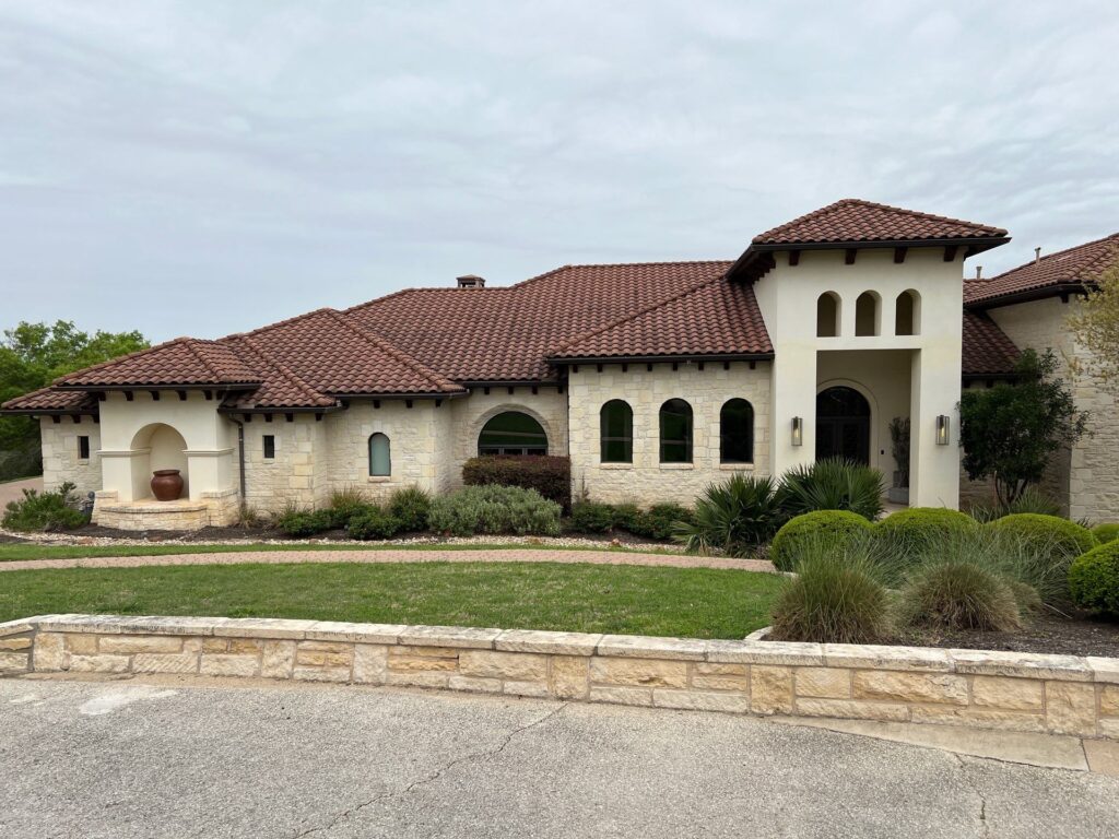 Luxury residential home with new roof replacement by Roof Experts