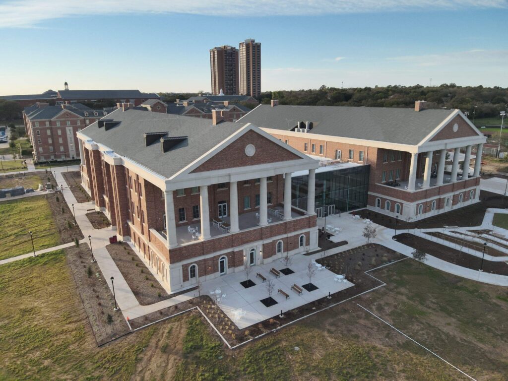 Aerial roof inspection of a commercial building by Roof Experts in Denton, TX