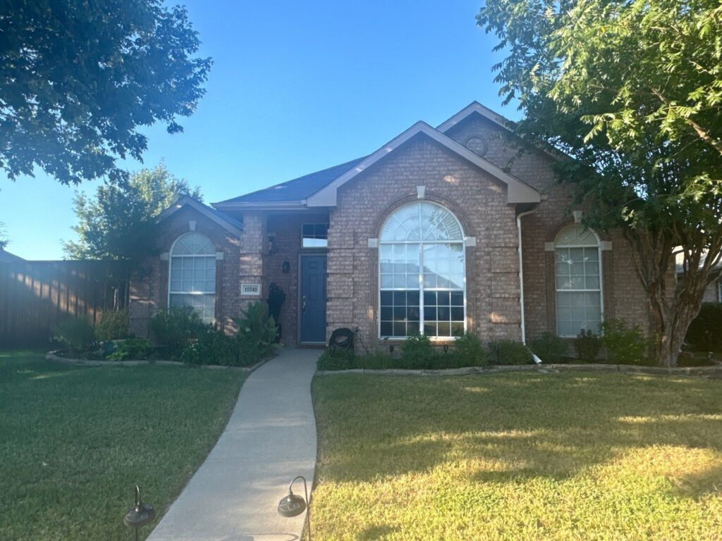 Completed roof replacement on a home in Frisco, TX