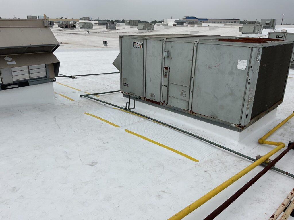 Commercial roof replacement in progress in Katy, TX